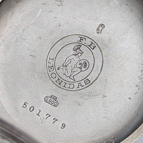 Swiss made antique Leonidas pocket watch flower sculpture silver side hunter case works well